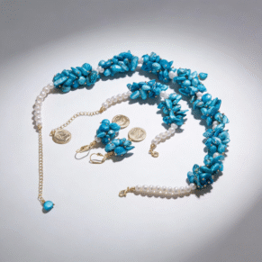 Parure perle dents de mer bleu et perle blanche et plaqué or