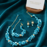 Parure perle dents de mer bleu et plaqué or