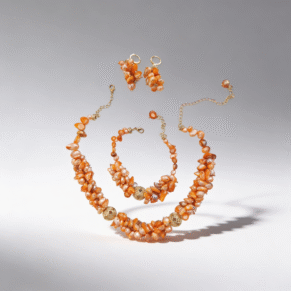 Parure perle dents de mer orange et plaqué or