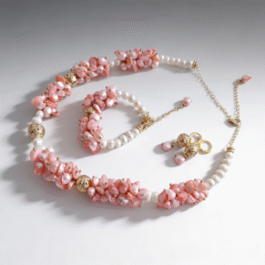 Parure perle dents de mer rose claire et perle blanche et plaqué or