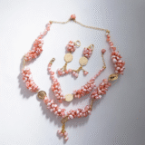 Parure perle dents de mer rose clair et plaqué or