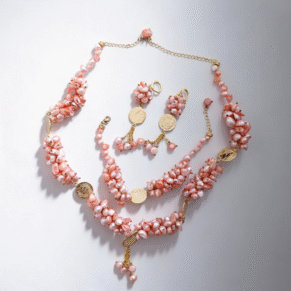 Parure perle dents de mer rose clair et plaqué or