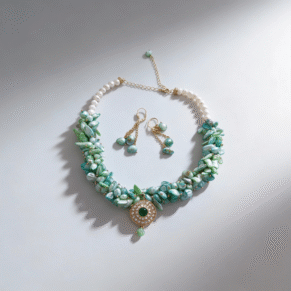 Parure perle dents de mer verte et johar blanche et plaqué or avec motif