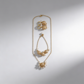 Parure plaqué or avec perle blanche